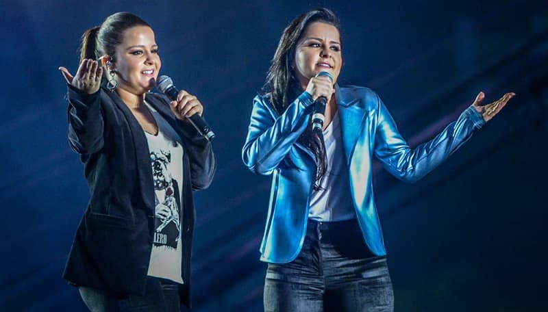 https://api.paranaibafm.com.br/mundo-dos-artistas/noticias/maiara-e-maraisa-pedem-que-mulher-se-retire-de-show-apos-gestos-obscenos/attachment/maiara-maraisa-sertanejo-1400x800/